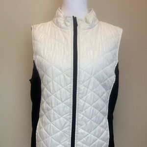 Exertek Quilted Vest in White with Black stretch material on sides.